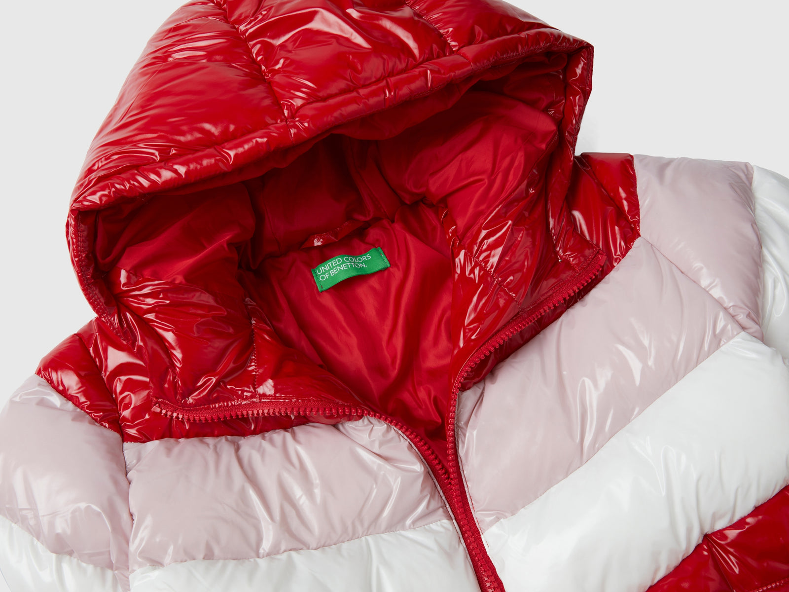 Giubbino imbottito color block da bambina rosso 3 | Benetton Outlet