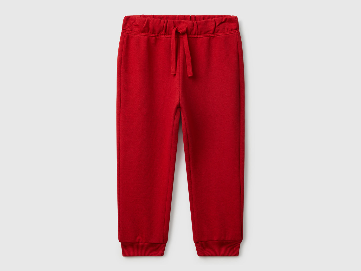 Joggers in felpa regular fit da bimbo rosso | Benetton Outlet