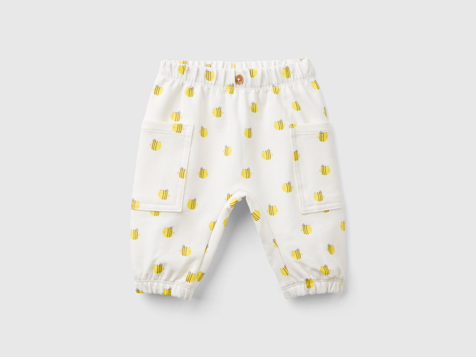 Pantaloni in felpa con stampa da neonato bianco panna | Benetton Outlet