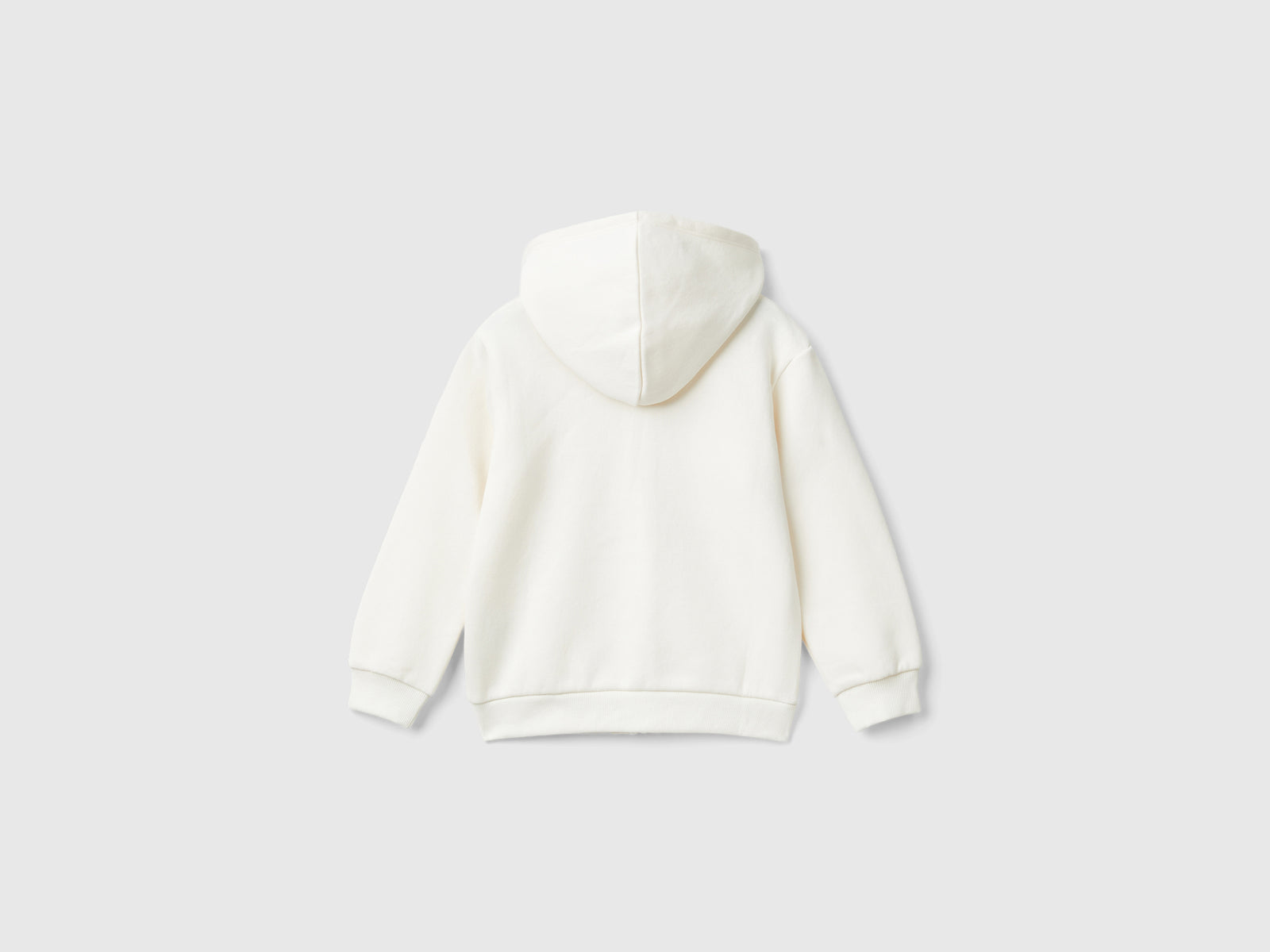 Felpa con zip e paillettes da bimba bianco panna 2 | Benetton Outlet