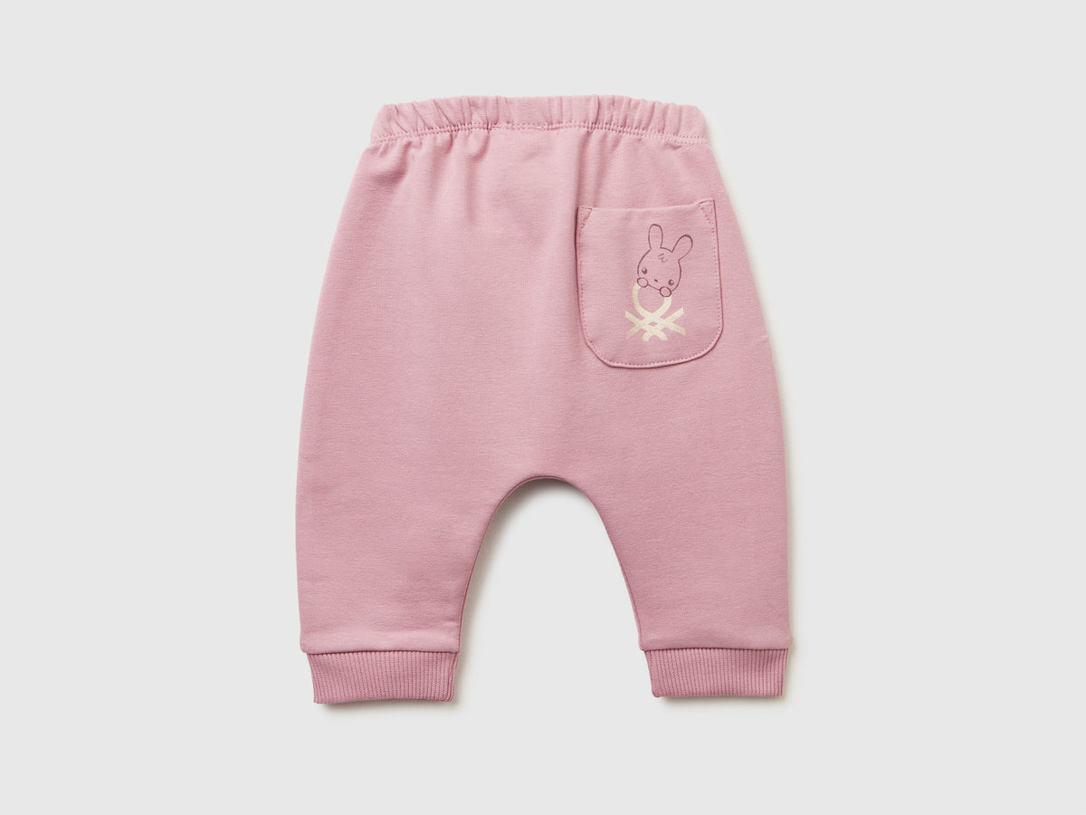 Pantaloni in calda felpa con taschino