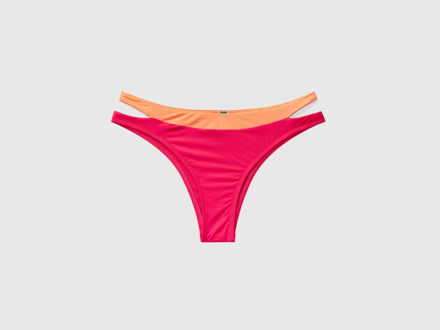 Slip mare bicolor elasticizzati con apertura ad oblò sui fianchi da donna fucsia | Benetton Outlet