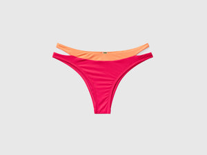 Slip mare bicolor elasticizzati con apertura ad oblò sui fianchi