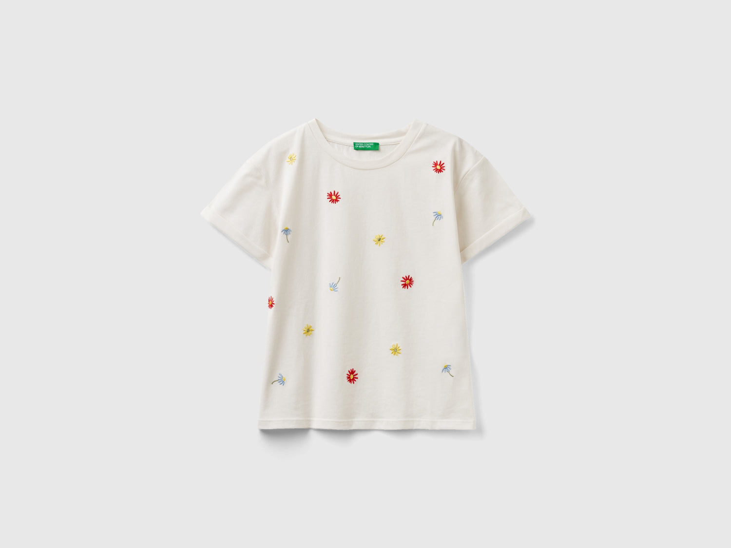 Maglietta con fiori ricamati da bambina bianco panna | Benetton Outlet