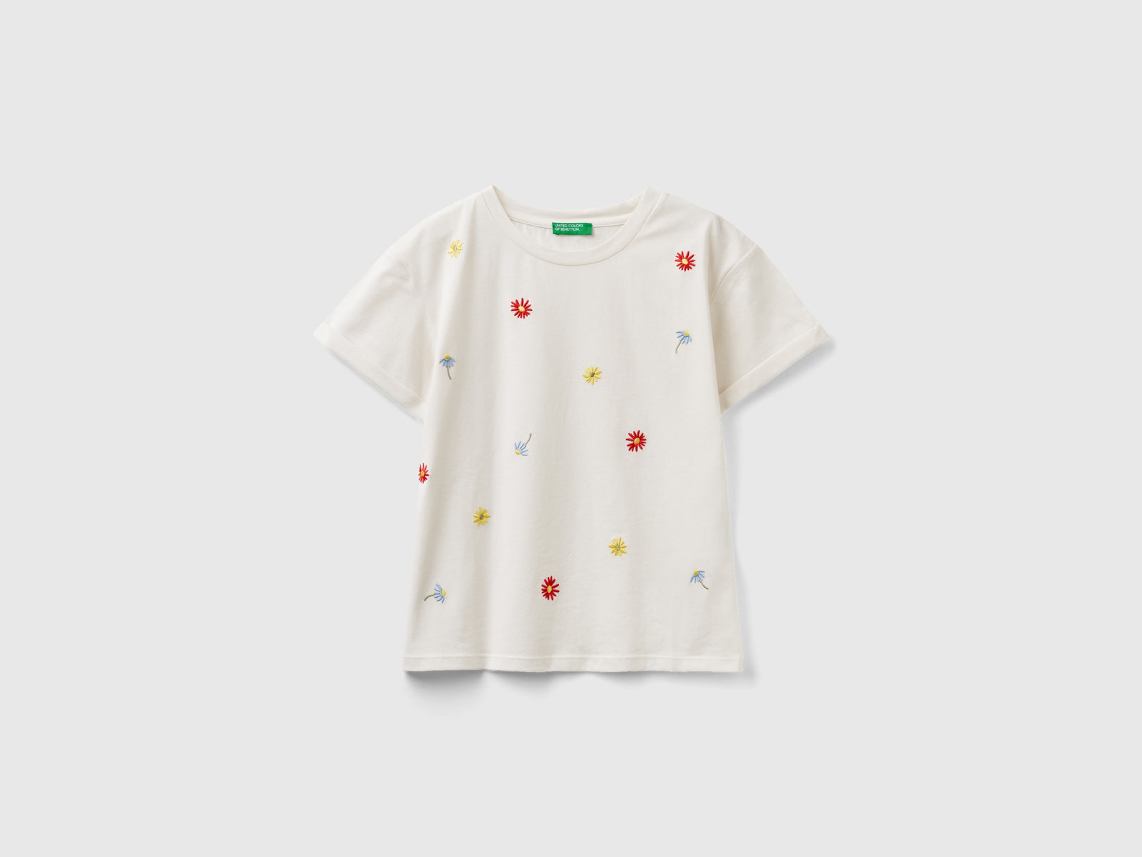 Maglietta con fiori ricamati da bambina bianco panna | Benetton Outlet