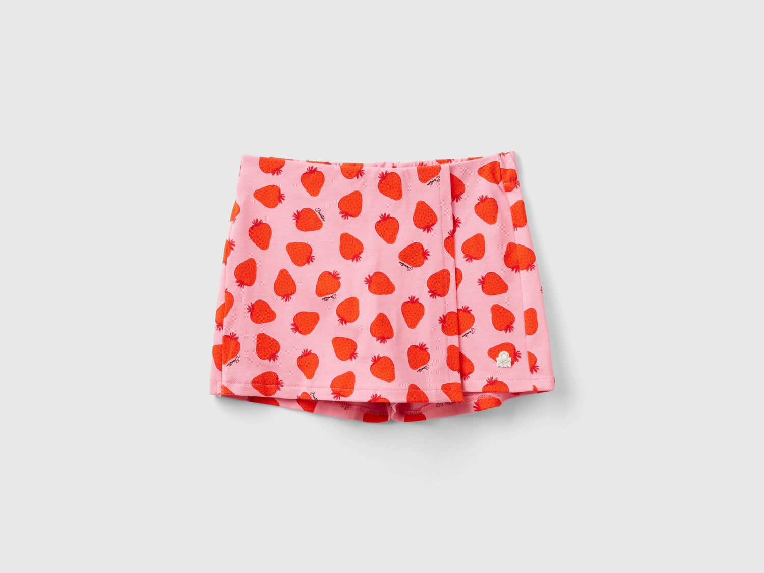 Gonna pantalone con pattern fragole da bambina rosa | Benetton Outlet