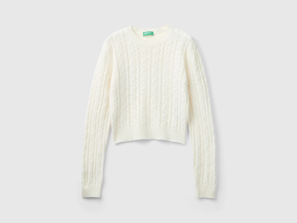 Maglia cropped con trecce e trafori