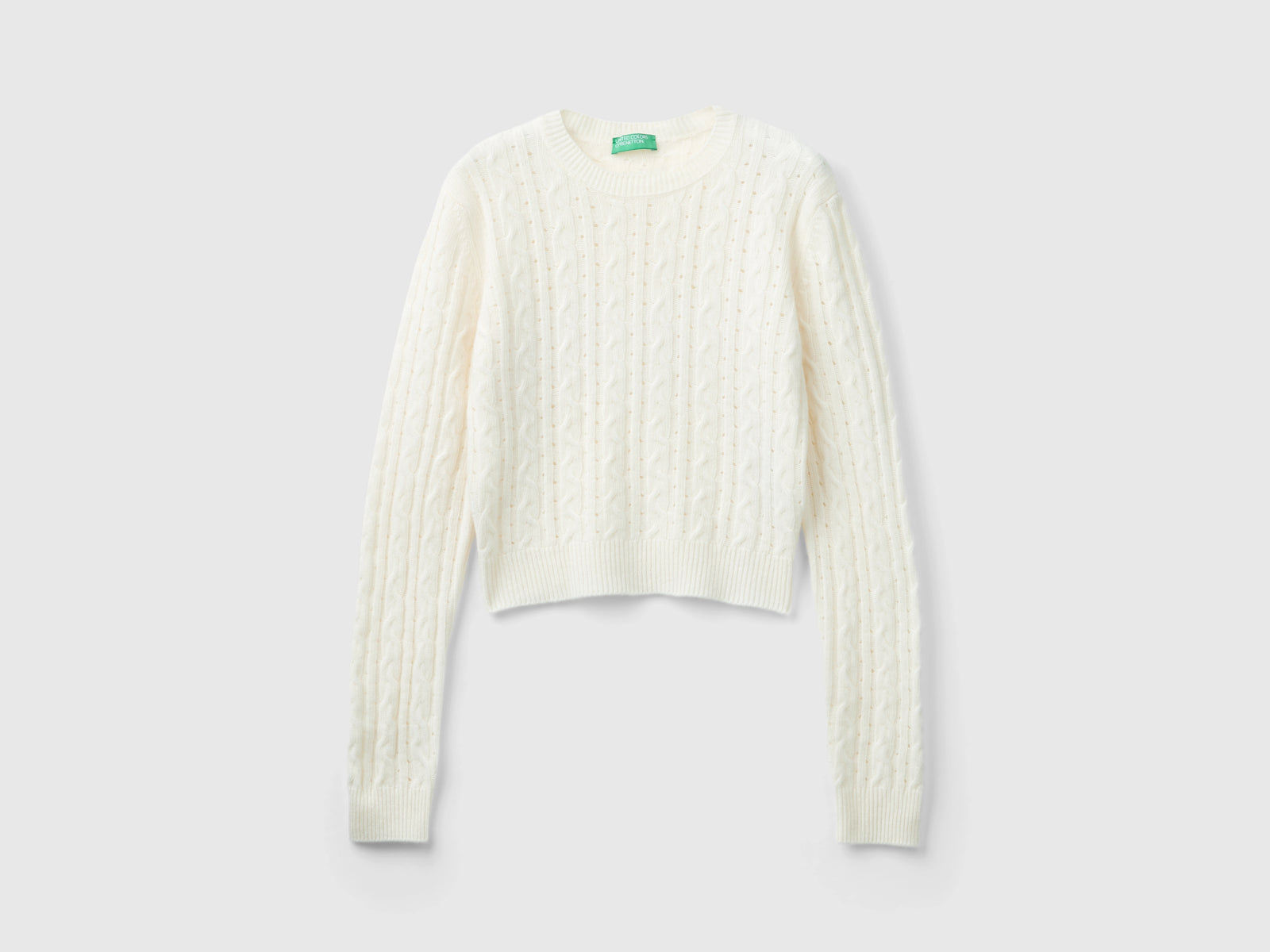 Maglia cropped con trecce e trafori da donna bianco panna | Benetton Outlet