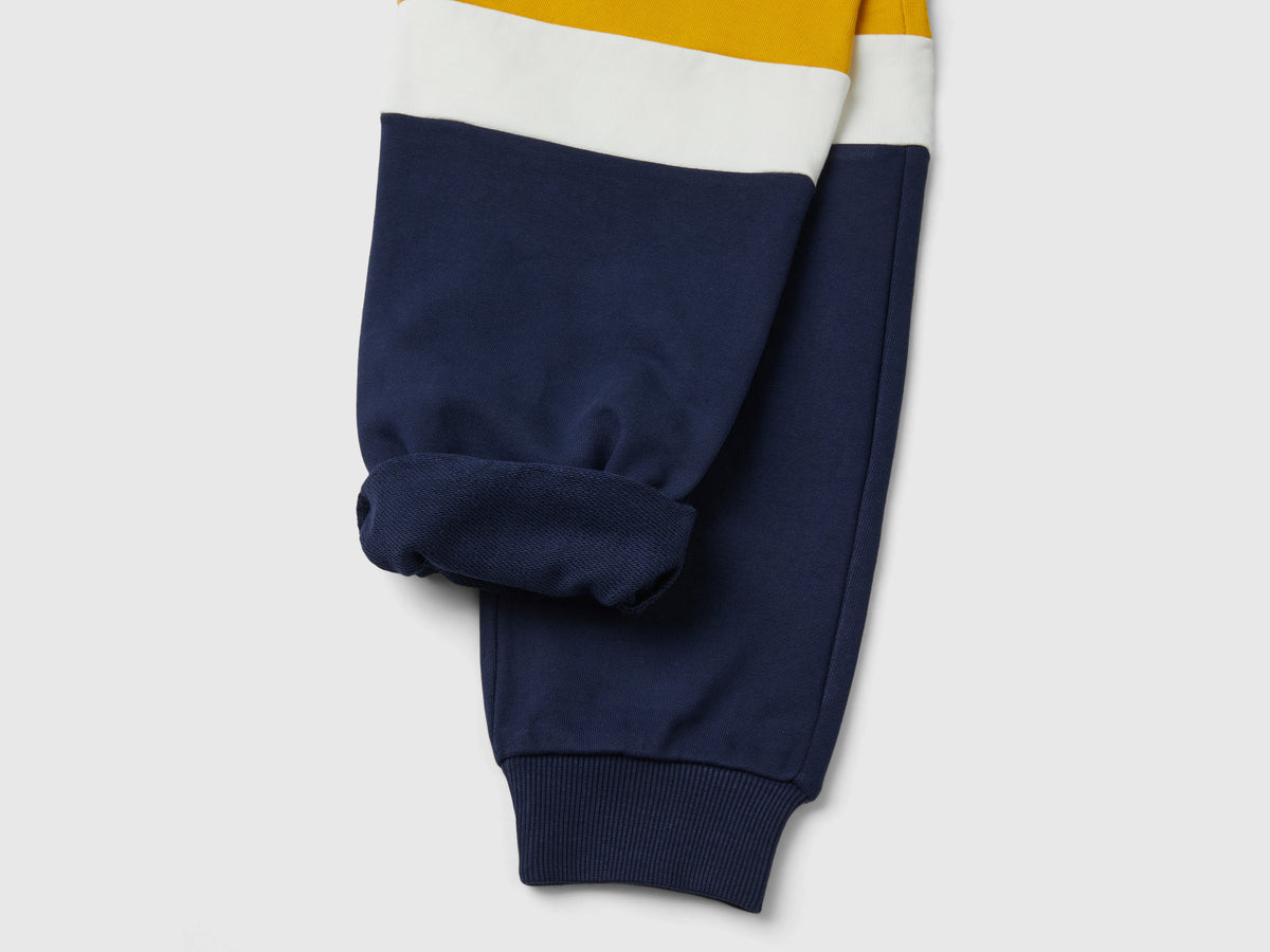 Joggers giallo ocra e blu scuro
