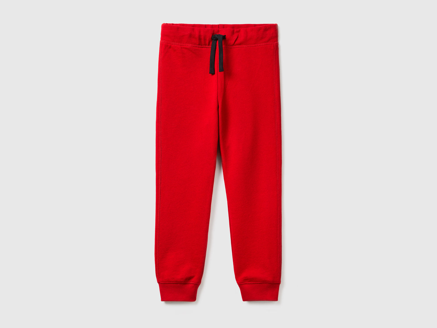 Pantaloni in felpa 100% cotone da bambino rosso | Benetton Outlet
