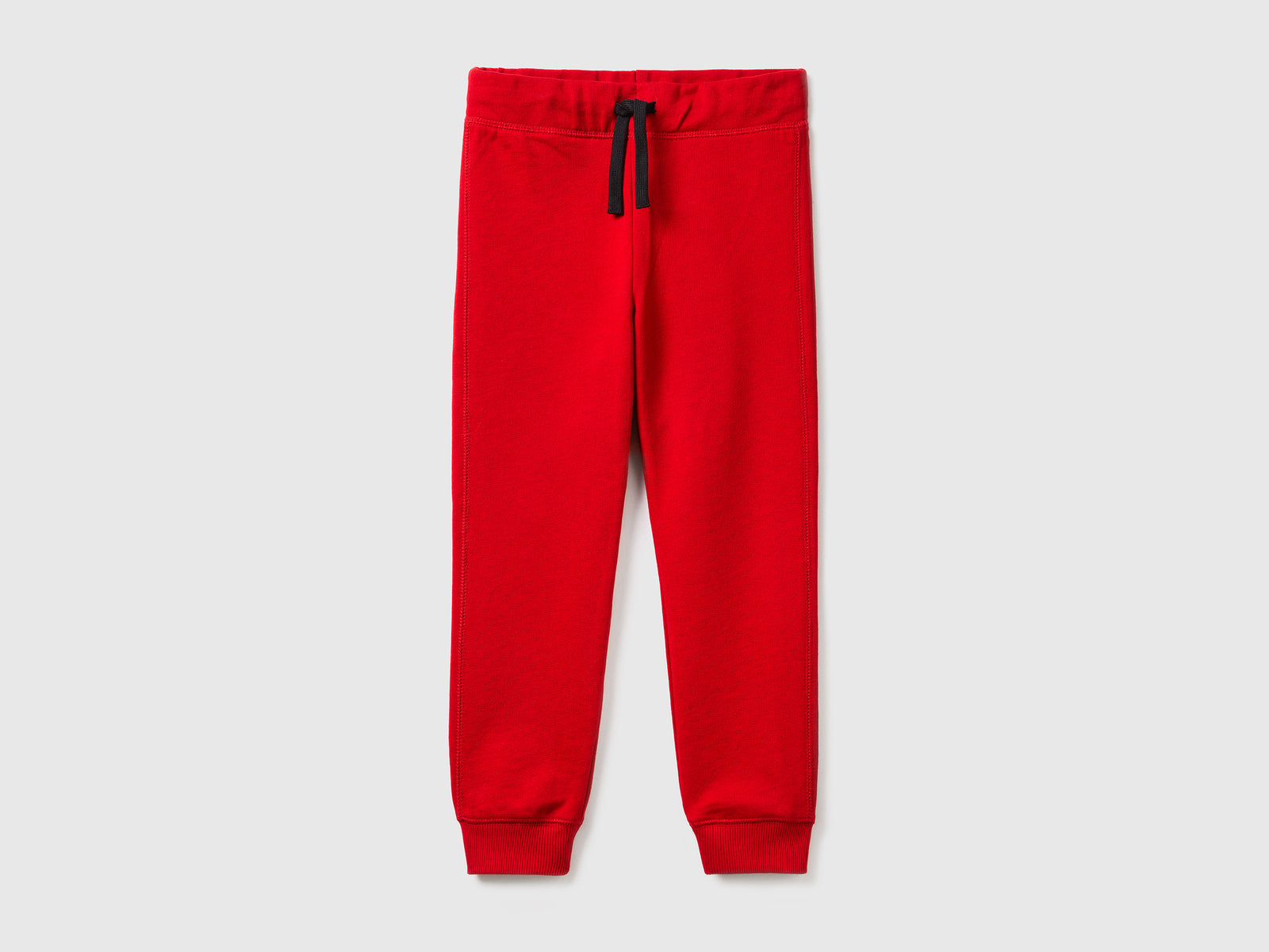 Pantaloni in felpa 100% cotone da bambino rosso | Benetton Outlet