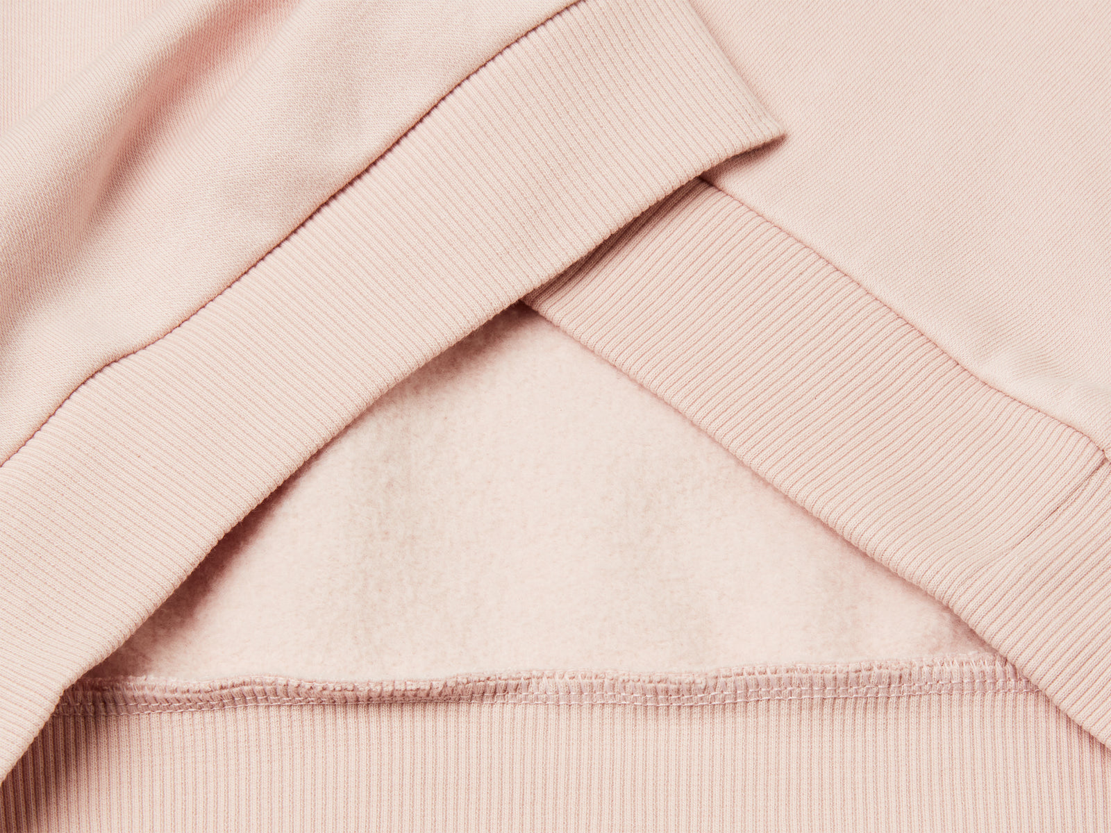 Felpa con cappuccio e paillettes da bambina rosa tenue 3 | Benetton Outlet