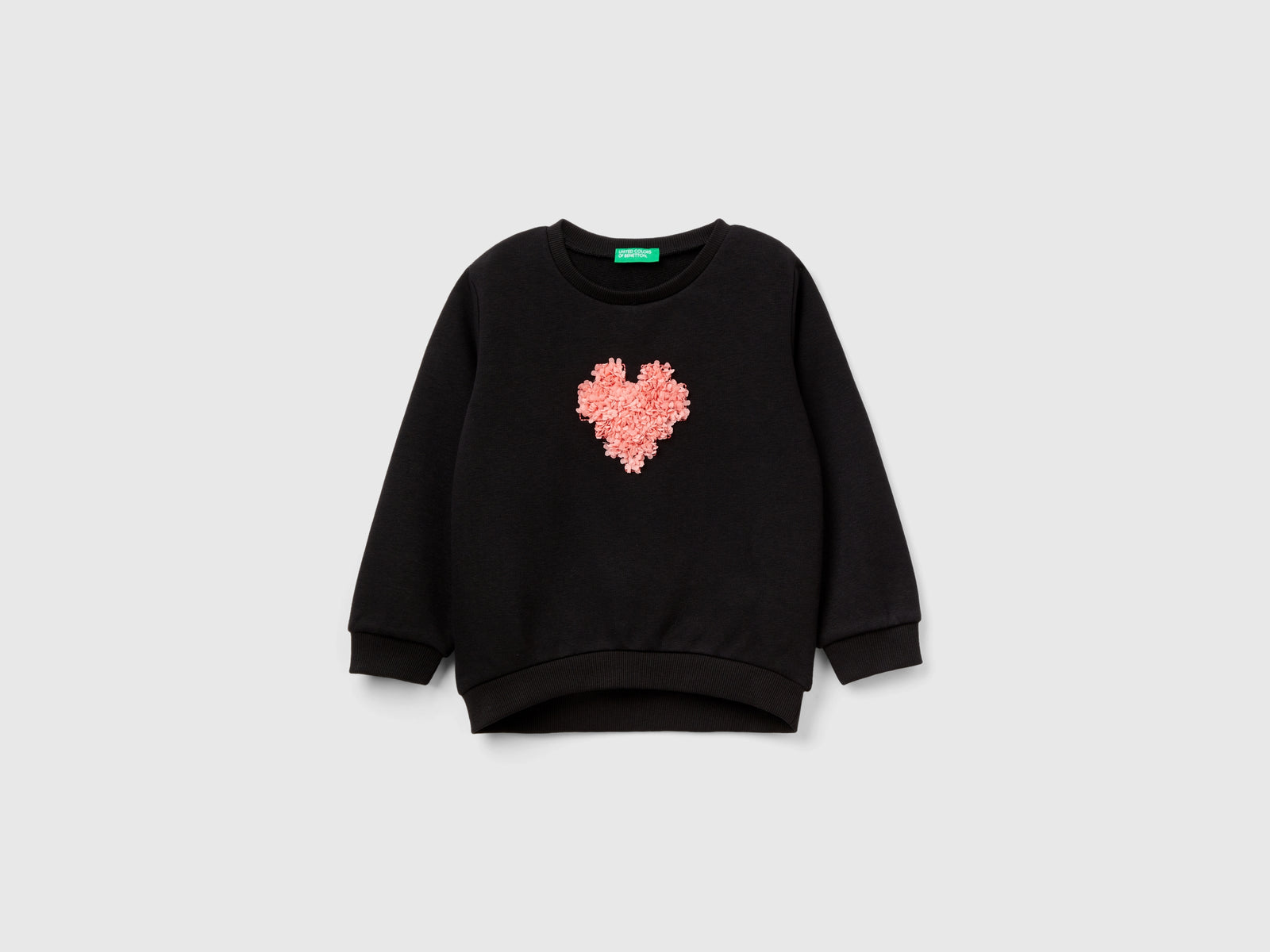 Felpa con applicazione effetto petali da bimba nero | Benetton Outlet