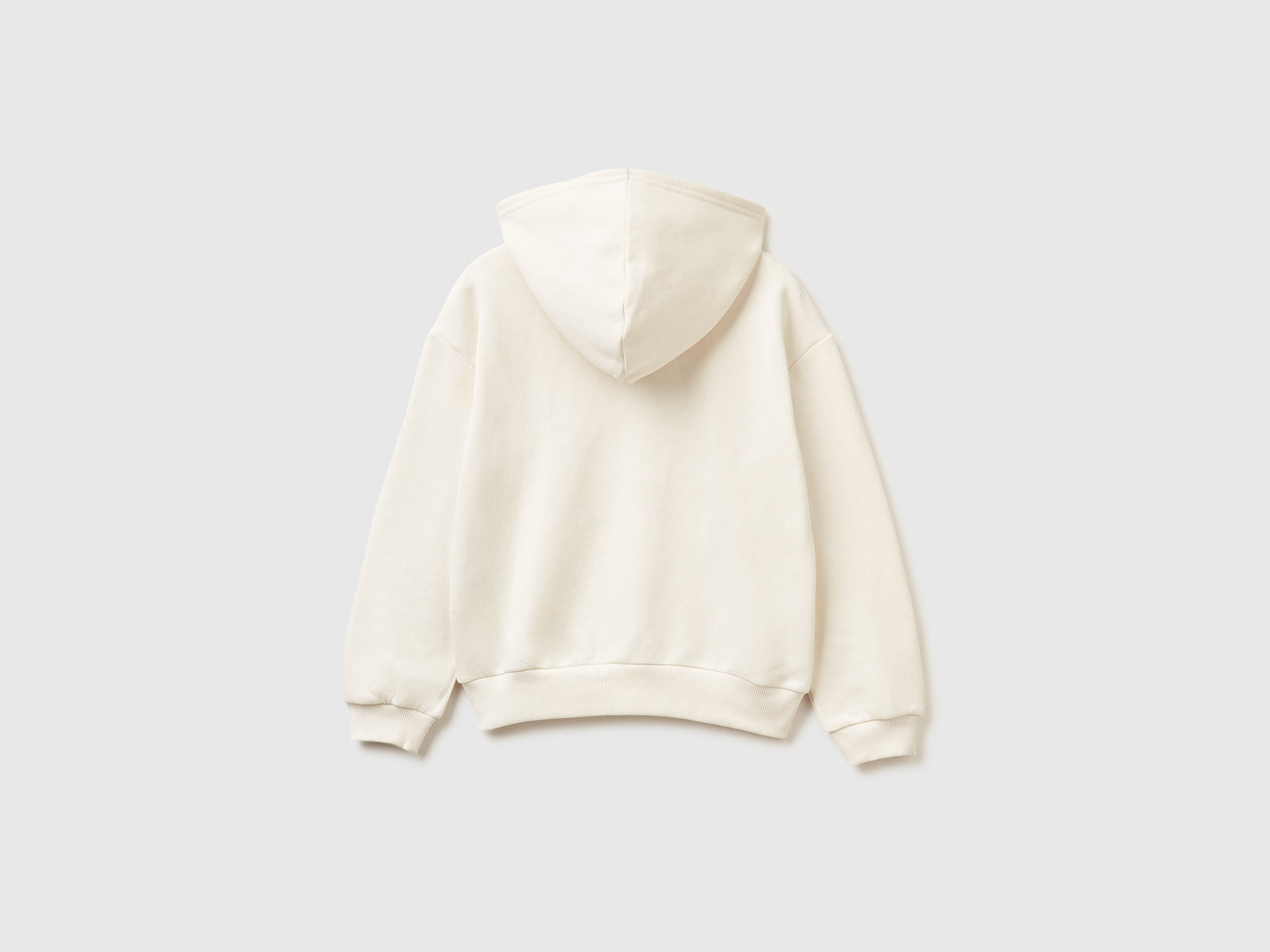 Felpa con zip e paillettes da bambina bianco panna 2 | Benetton Outlet