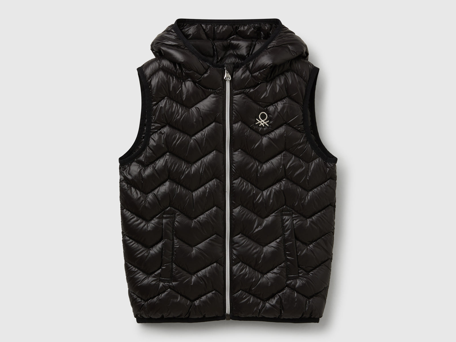 Gilet imbottito con cappuccio da bambina nero | Benetton Outlet