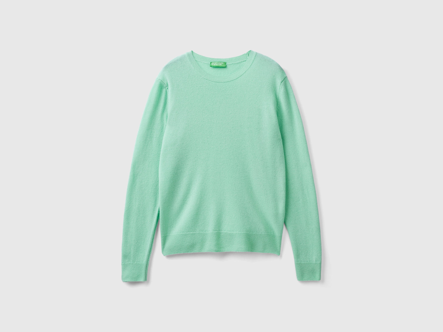 Maglia girocollo chiaro in pura lana Merino da donna verde acqua | Benetton Outlet