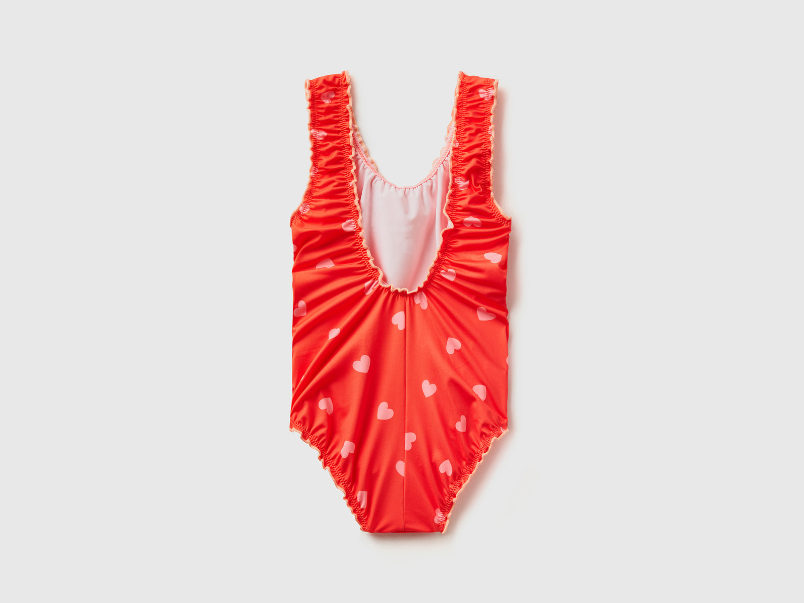 Costume intero in tessuto elasticizzato con stampa cuori da bambina rosso 2 | Benetton Outlet