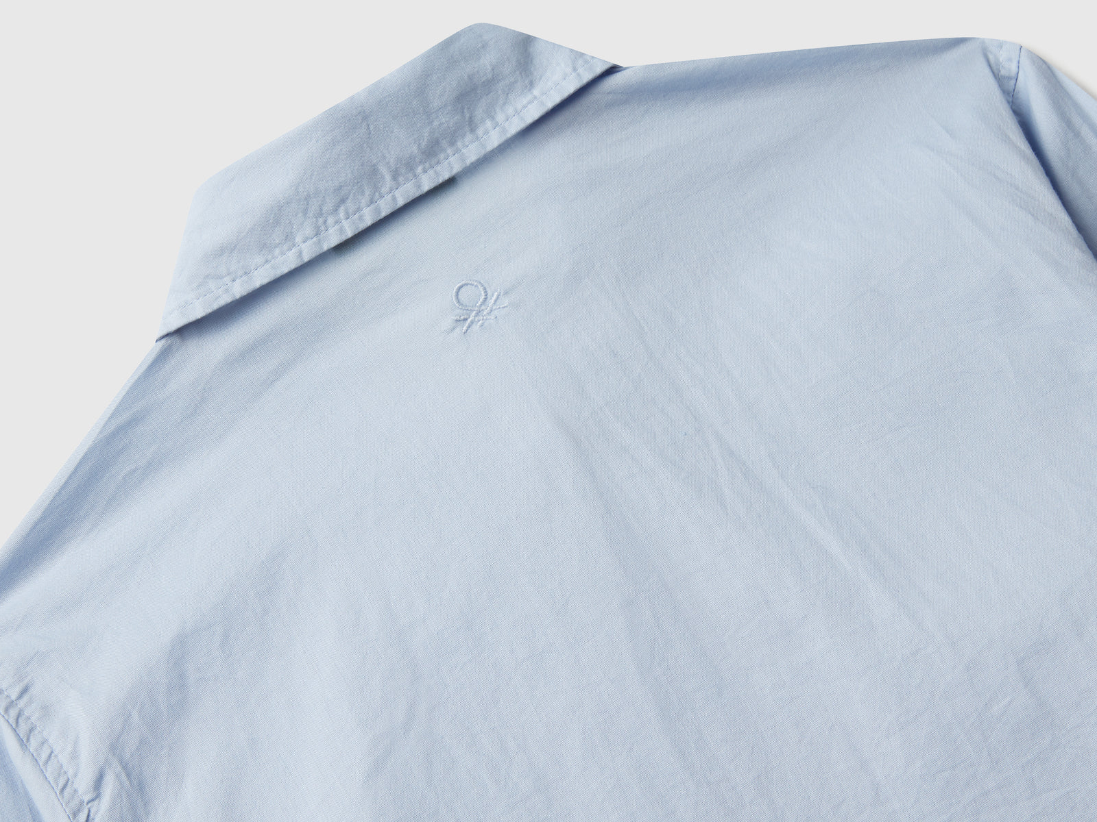 Camicia over fit da bambina azzurro 3 | Benetton Outlet