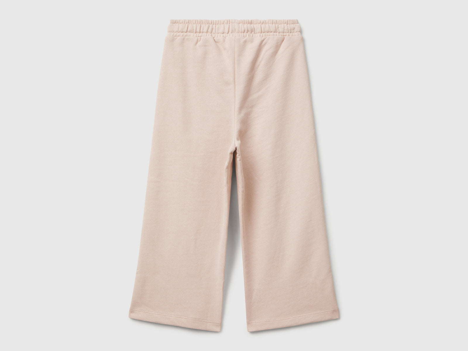 Pantaloni in felpa wide fit da bimba rosa tenue 2 | Benetton Outlet