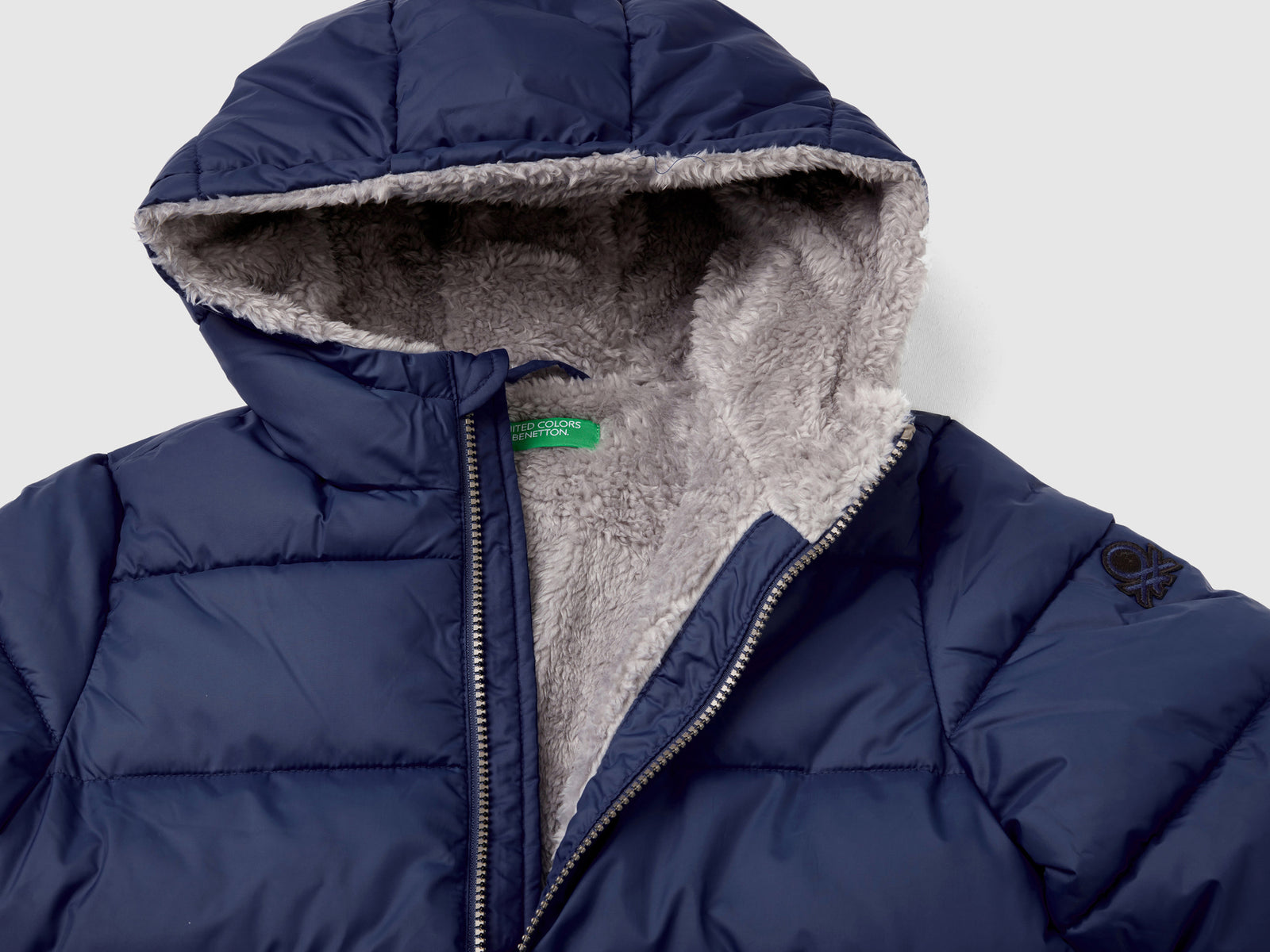 Giubbotto imbottito con interno orsetto da bambino blu scuro 3 | Benetton Outlet