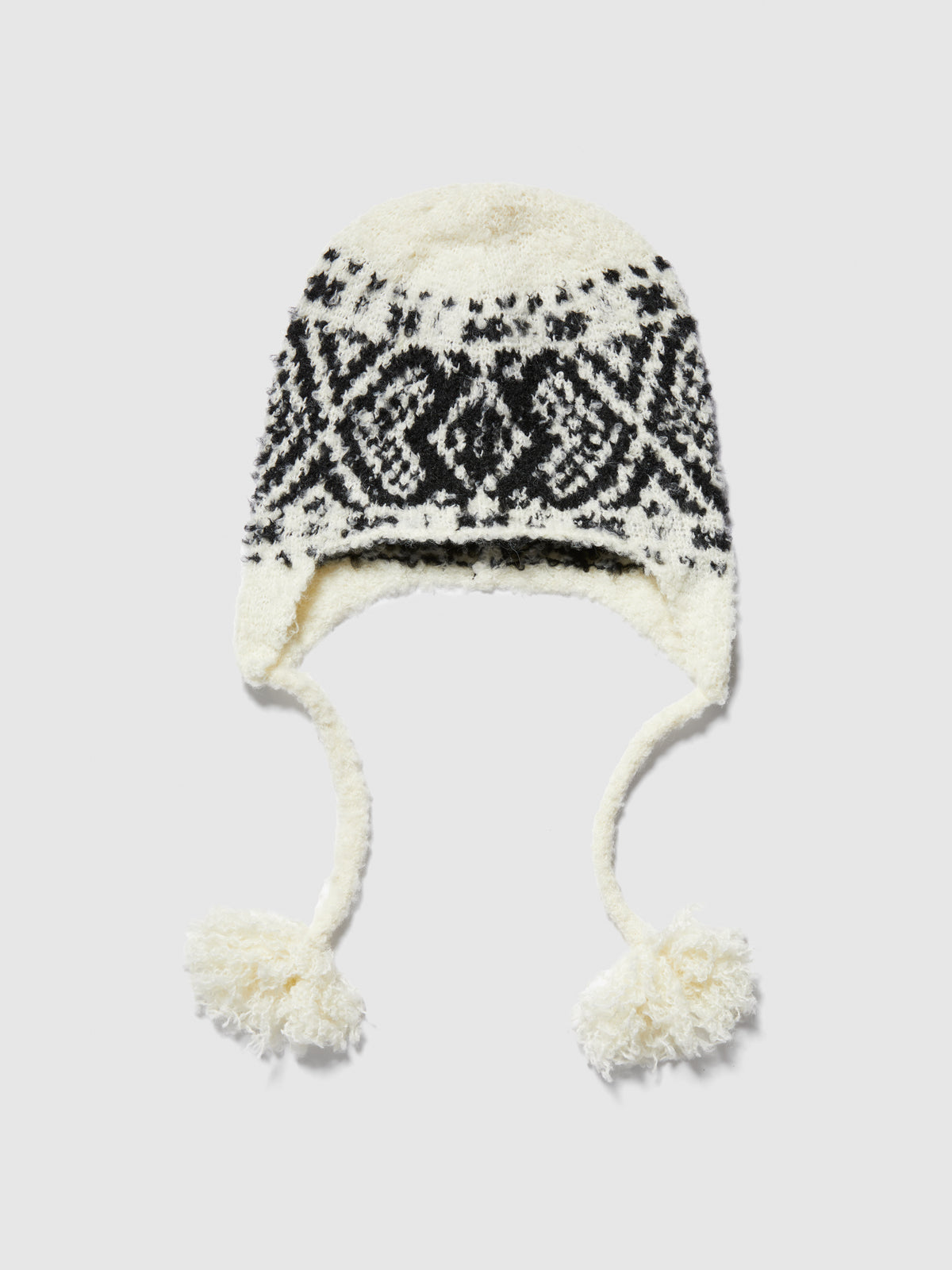 Cappello jacquard con trecce