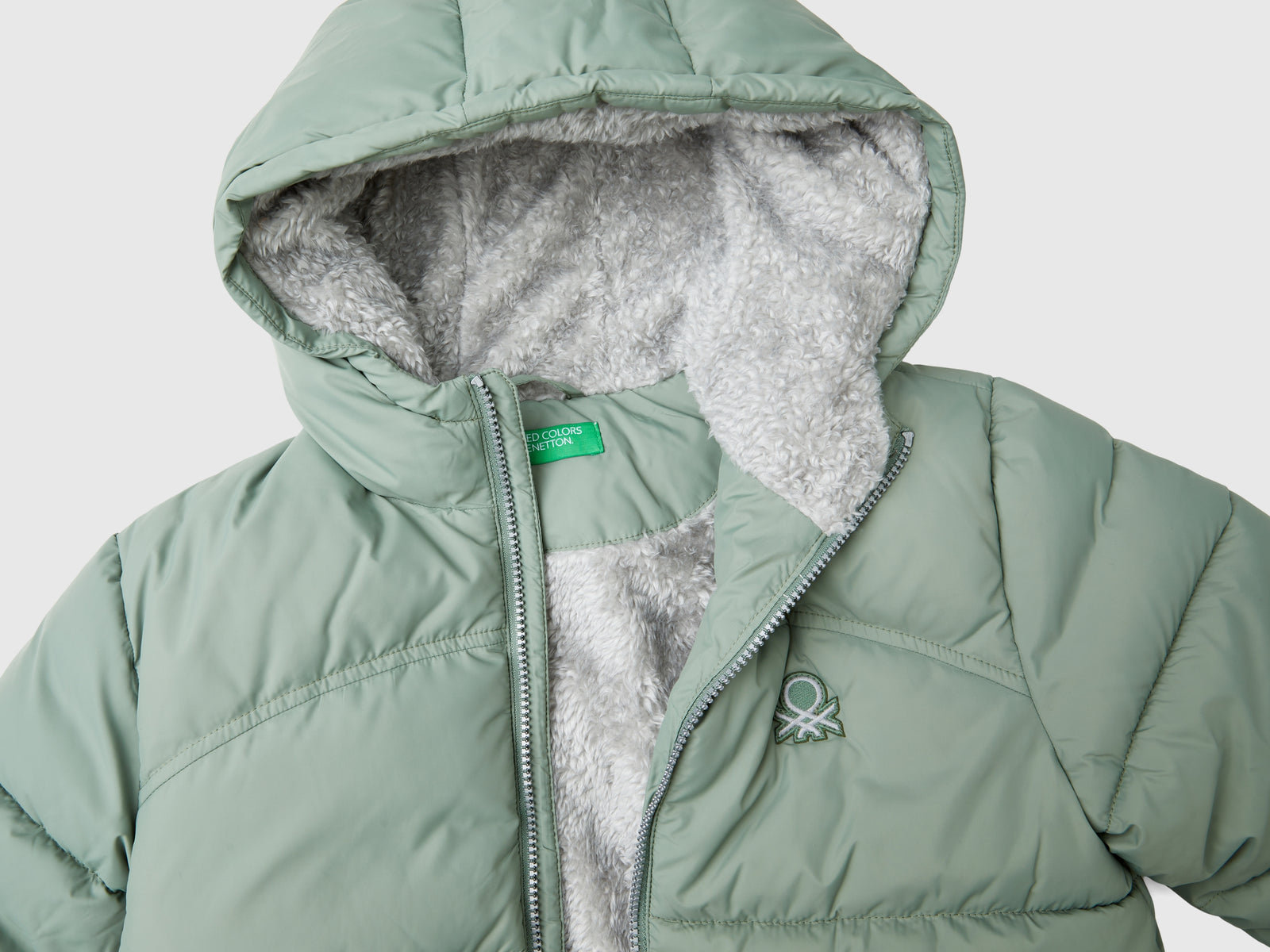 Giubbotto imbottito con interno orsetto da bambino verde chiaro 3 | Benetton Outlet