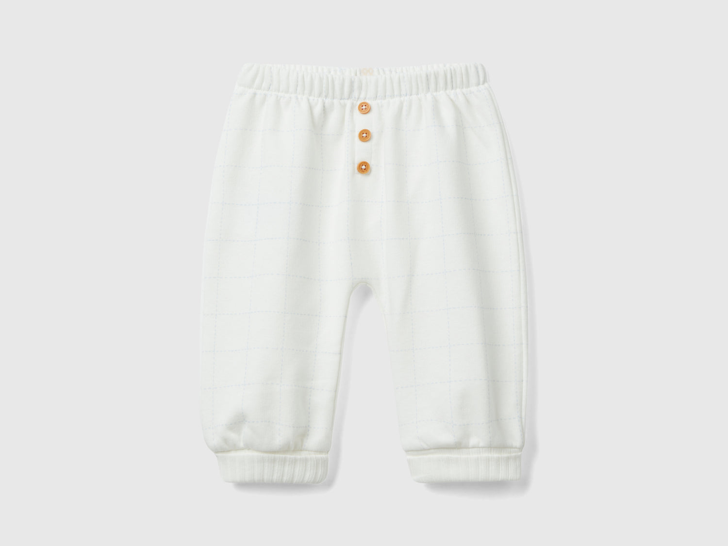 Pantaloni in felpa con bottoni da neonato bianco panna | Benetton Outlet