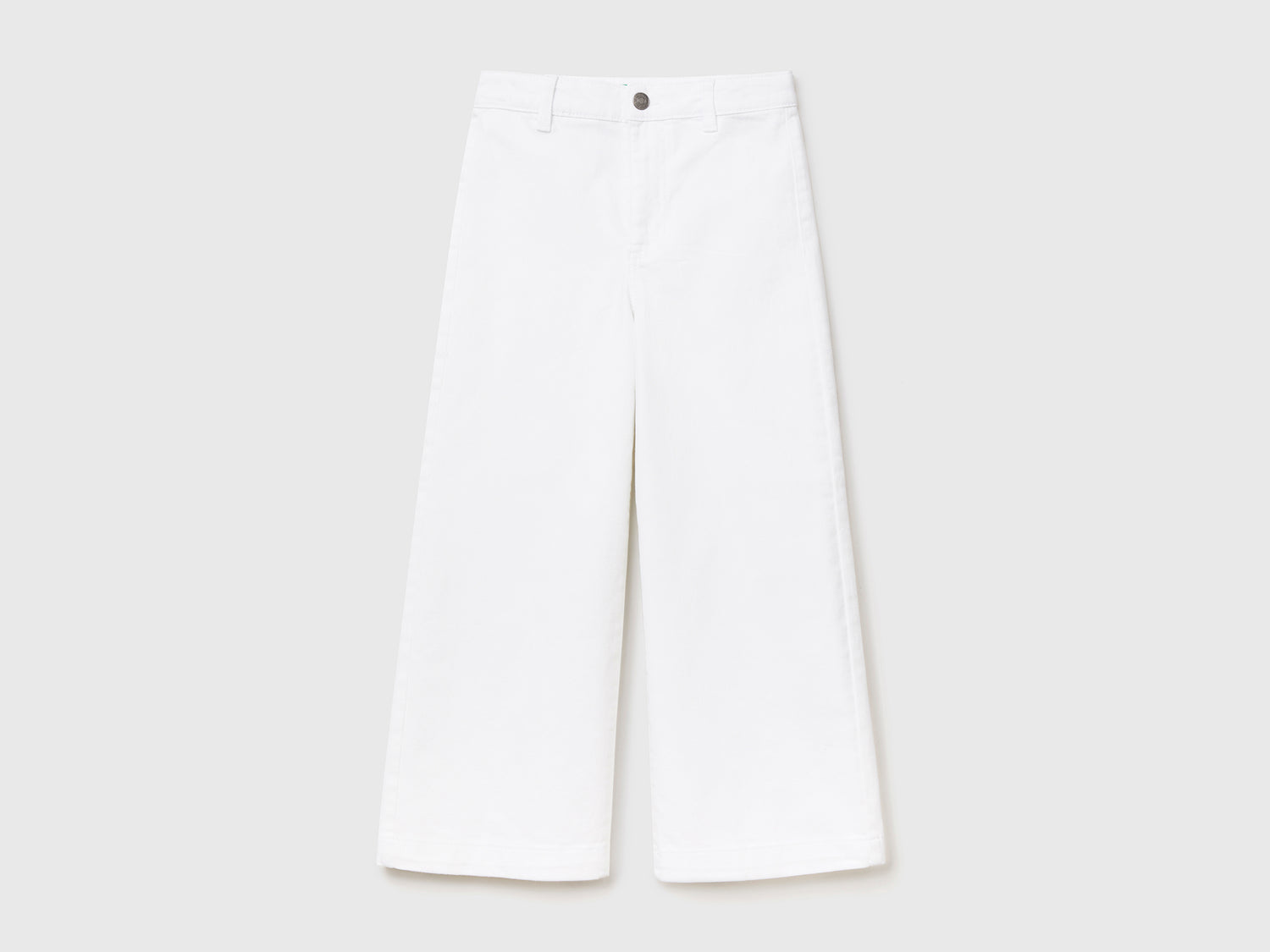 Pantaloni lunghi a vita alta in cotone elasticizzato da bambina bianco | Benetton Outlet