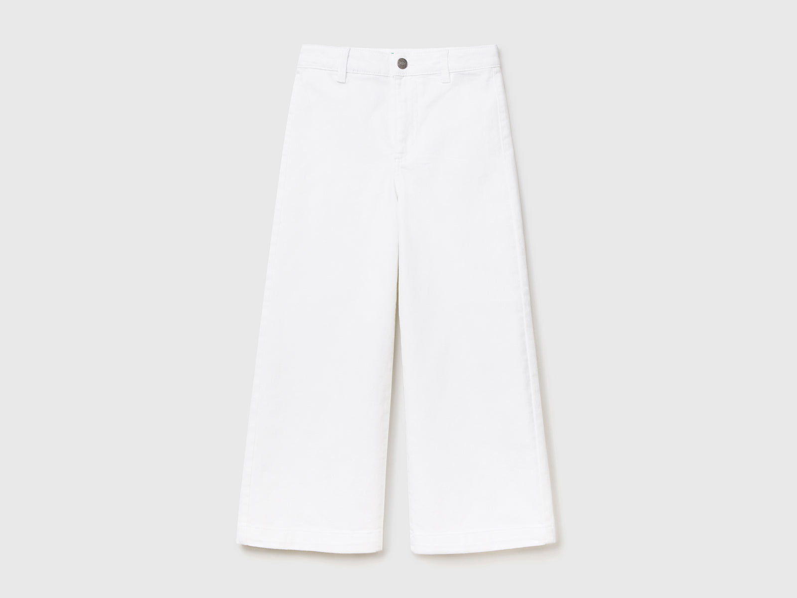 Pantaloni lunghi a vita alta in cotone elasticizzato da bambina bianco | Benetton Outlet
