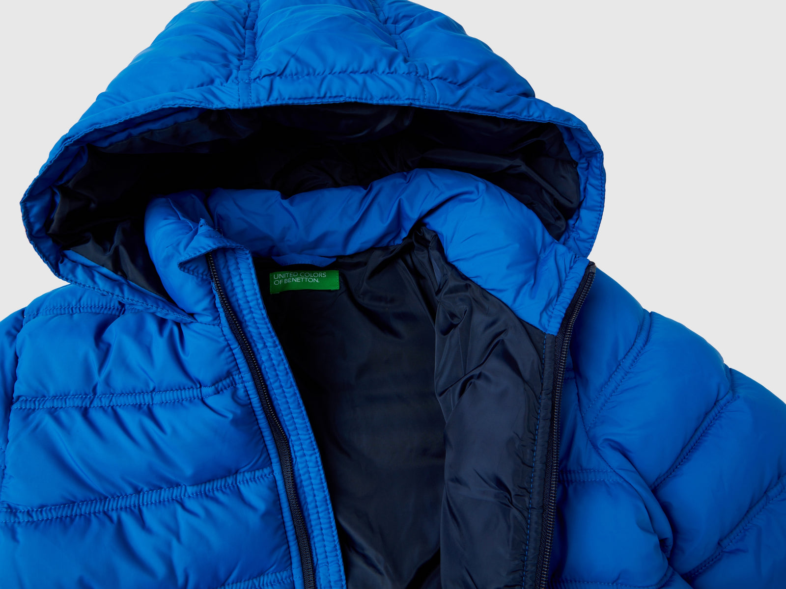Giubbotto imbottito con cappuccio e logo da bambino bluette 3 | Benetton Outlet