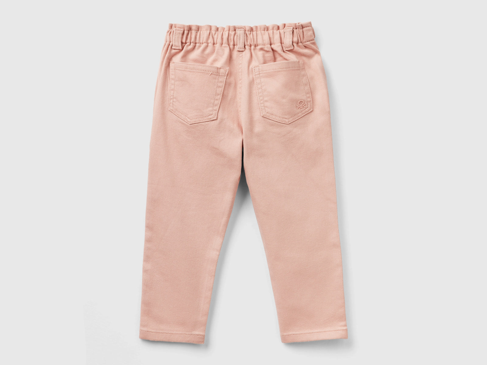 Pantaloni paperbag da bimba rosa pastello 2 | Benetton Outlet