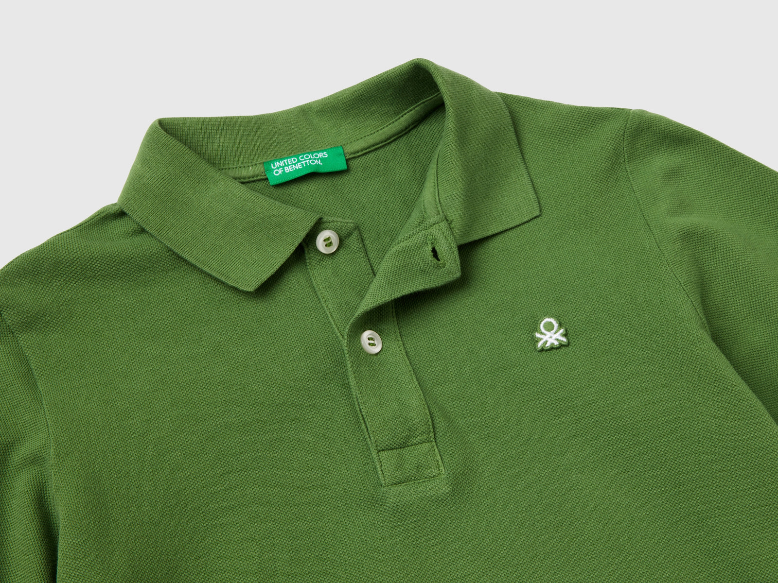 Polo slim fit 100% cotone da bambino verde 2 | Benetton Outlet