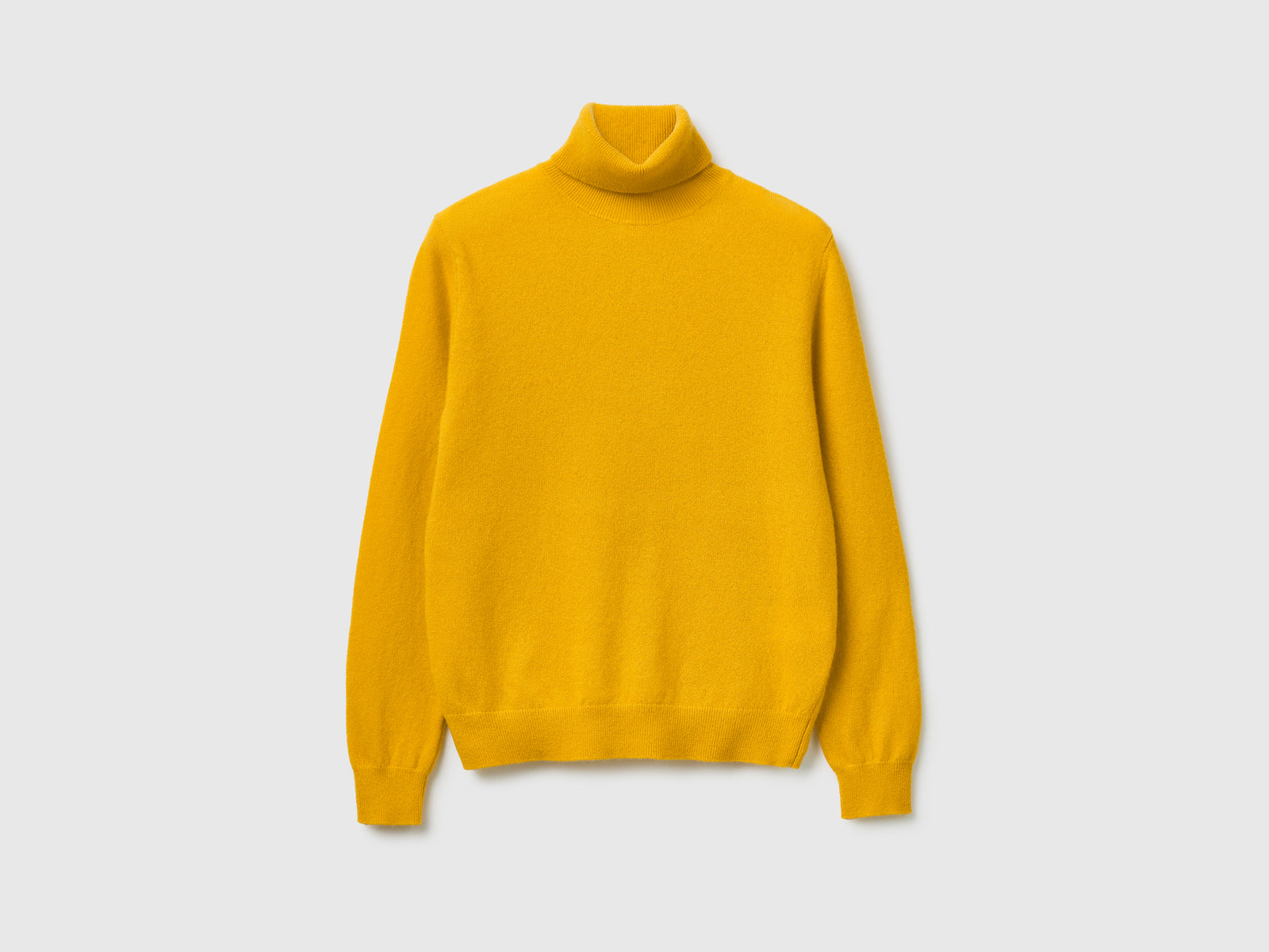 Maglione dolcevita giallo ocra in pura lana Merino da donna senape | Benetton Outlet