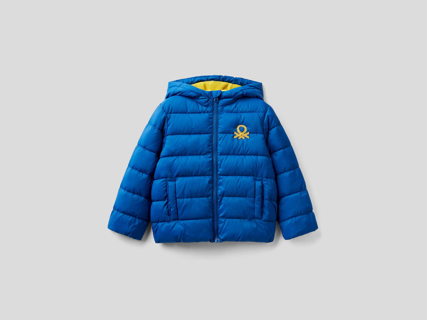 Giubbotto imbottito con cappuccio e logo da bimbo bluette | Benetton Outlet