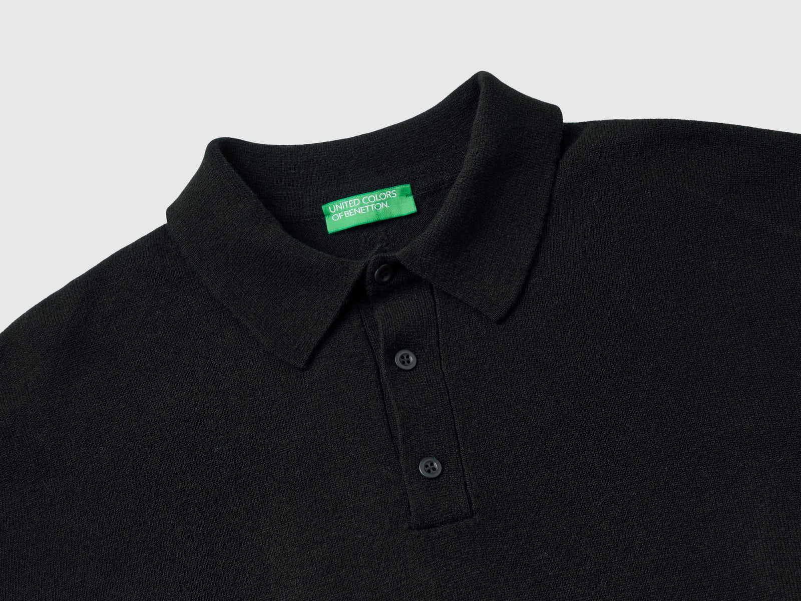 Polo in pura lana Merino da uomo nero 3 | Benetton Outlet