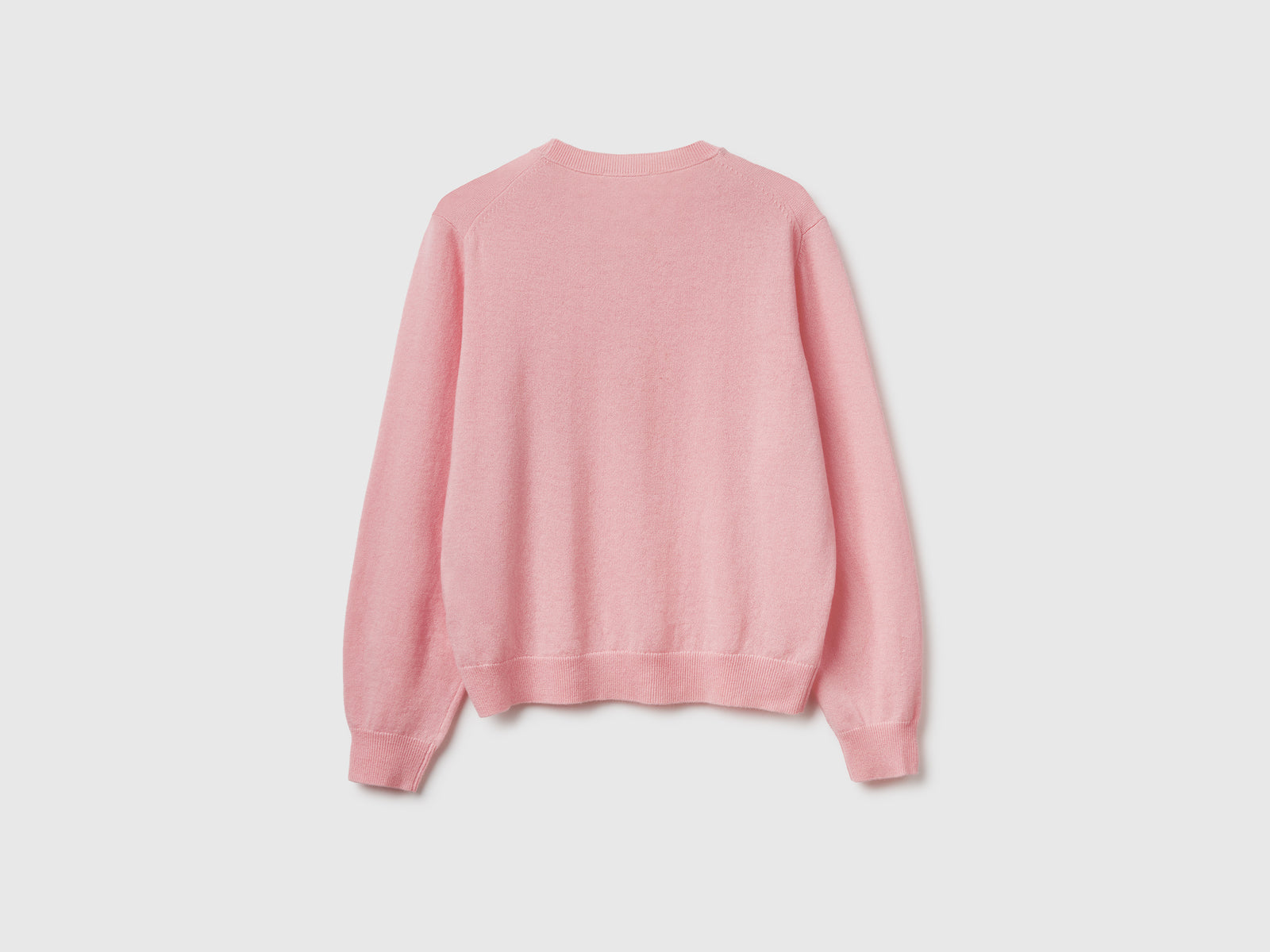Maglia relaxed fit in pura lana Merino da donna rosa tenue 2 | Benetton Outlet