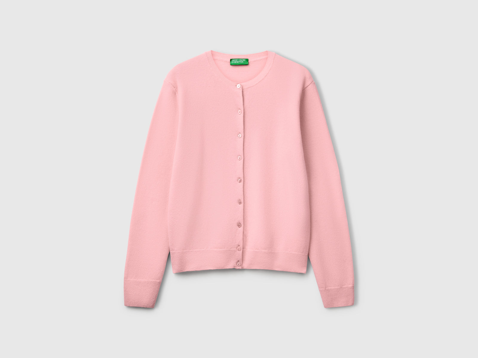 Cardigan girocollo rosa cipria in pura lana Merino da donna rosa tenue | Benetton Outlet