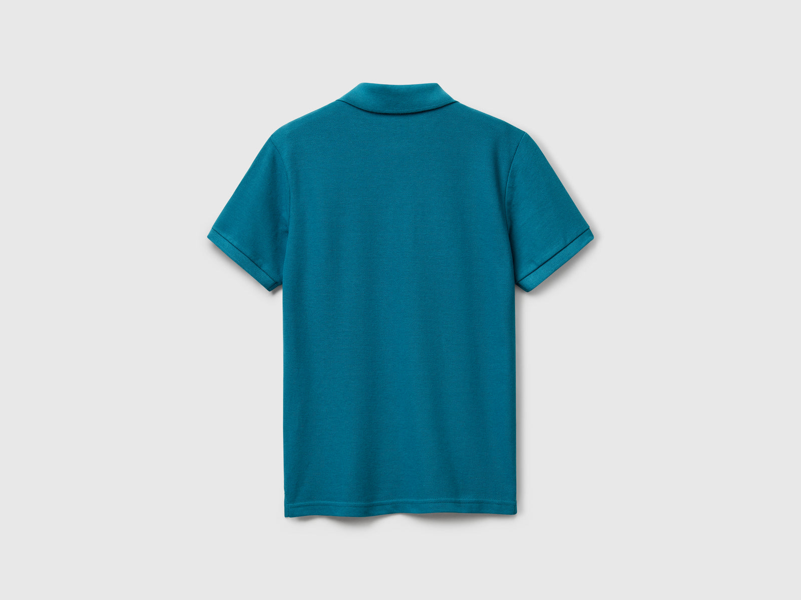 Polo slim fit in puro cotone da bambino verde ottanio 2 | Benetton Outlet