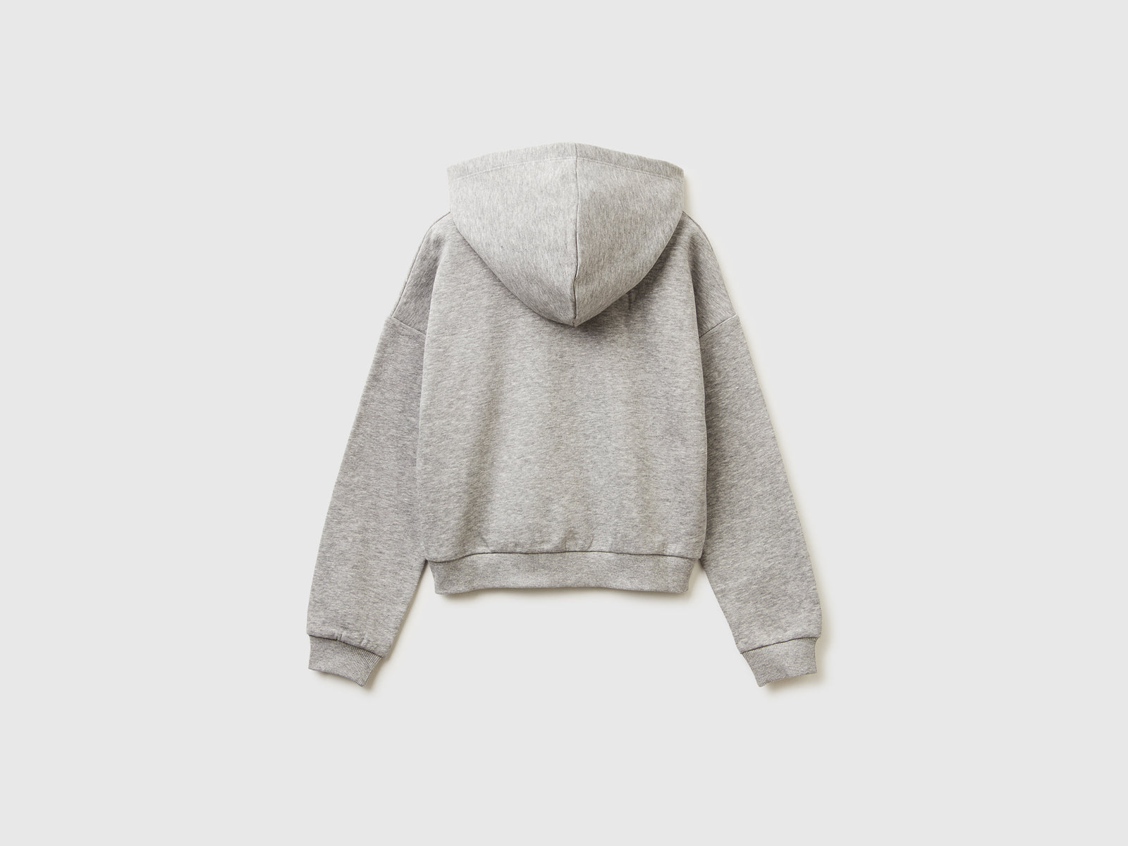 Felpa con cappuccio e paillettes da bambina grigio chiaro 2 | Benetton Outlet