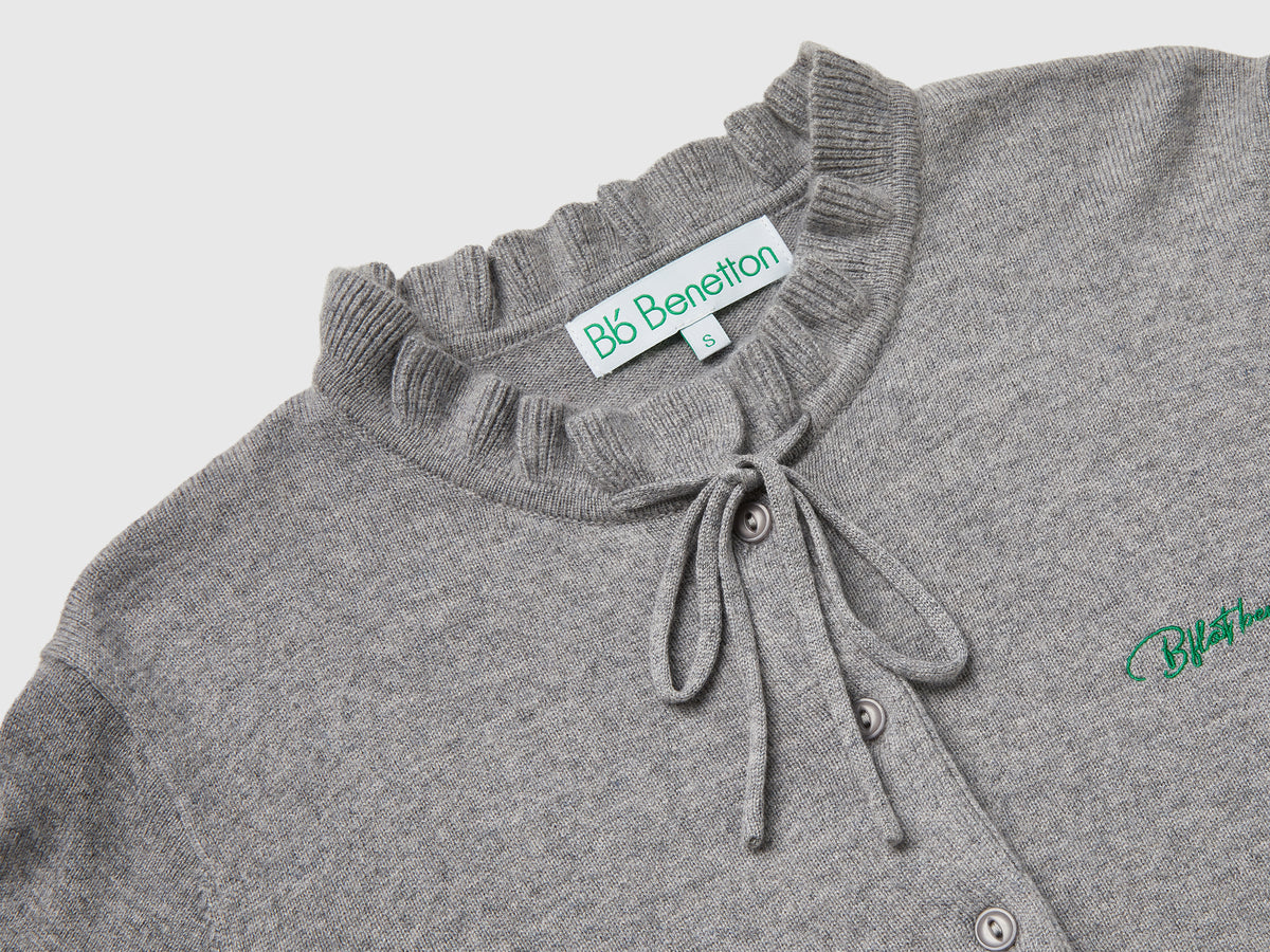 Cardigan con collo rouches