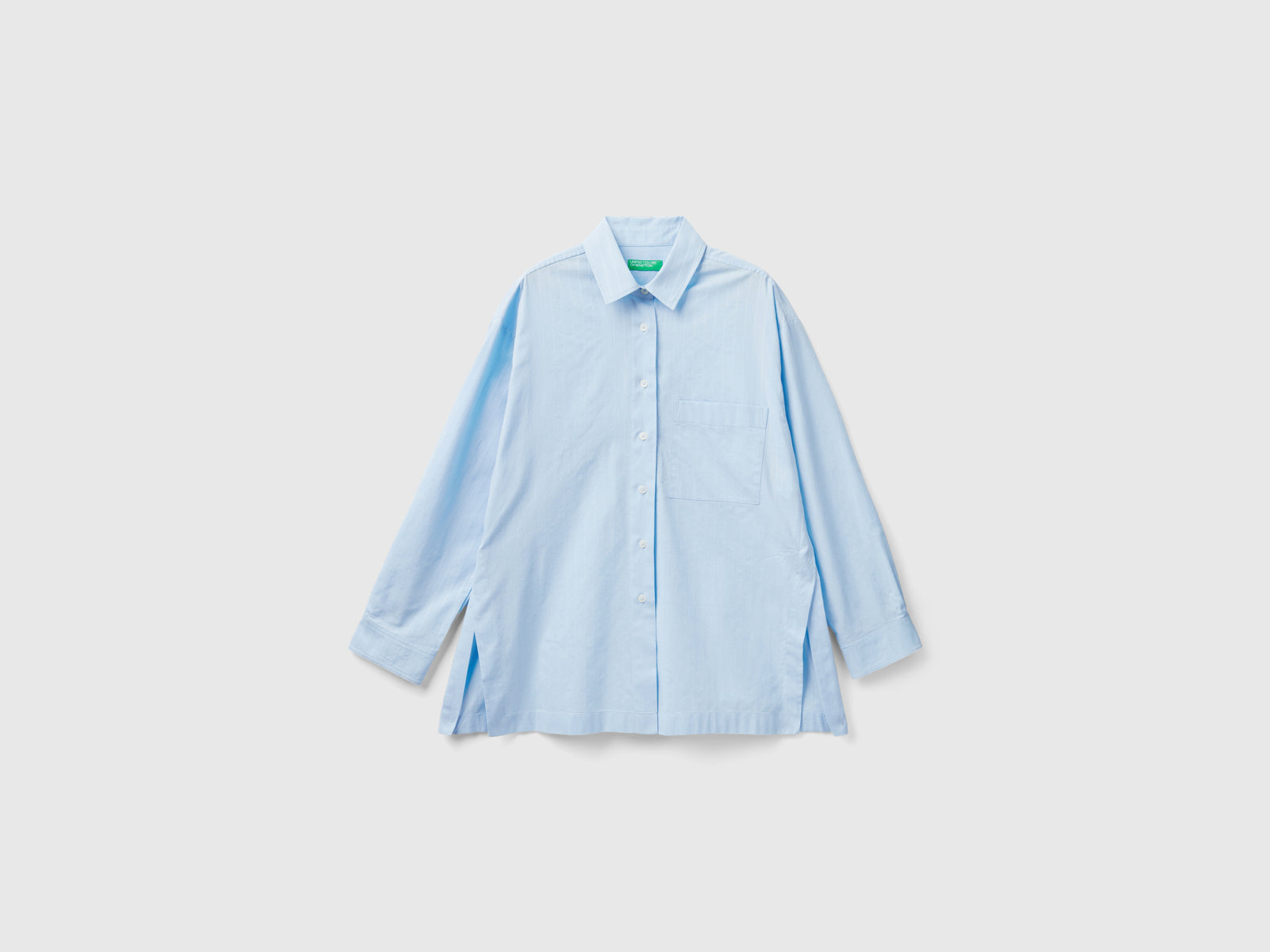 Camicia leggera over fit con spacchi da donna celeste | Benetton Outlet