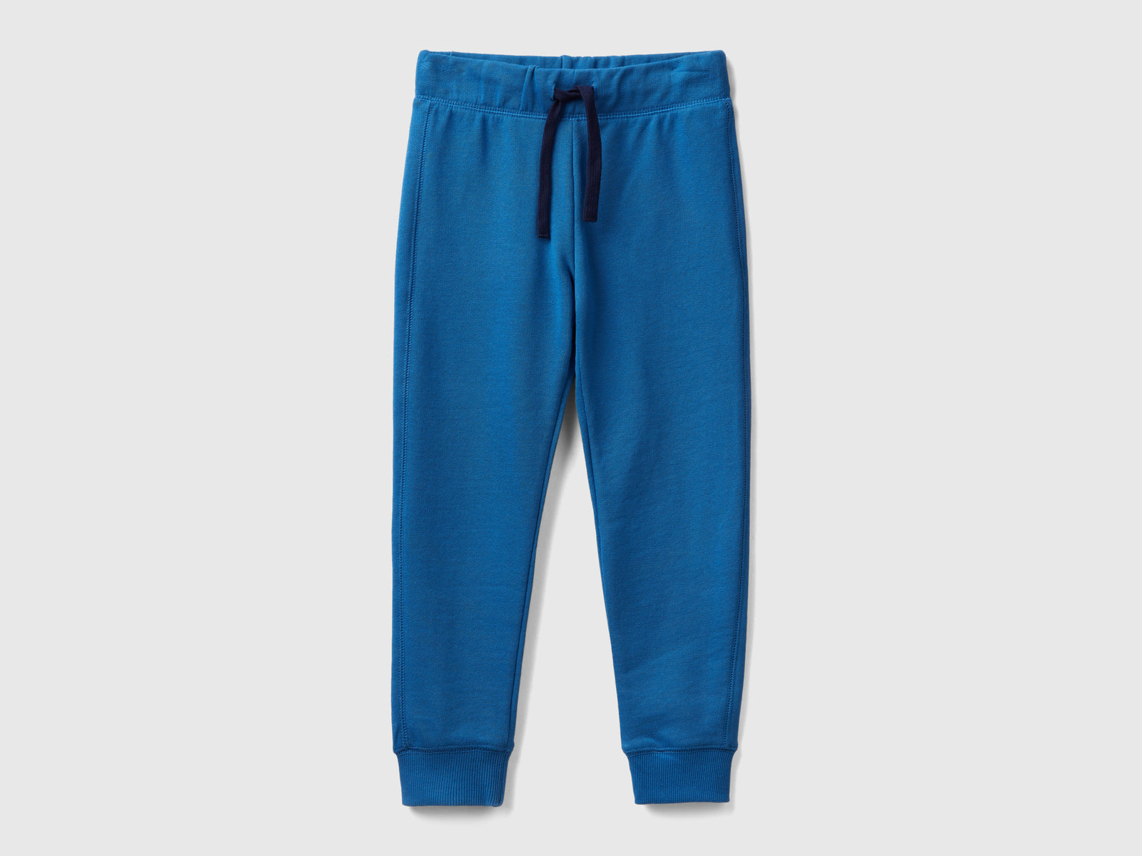 Pantaloni in felpa 100% cotone da bambino blu | Benetton Outlet
