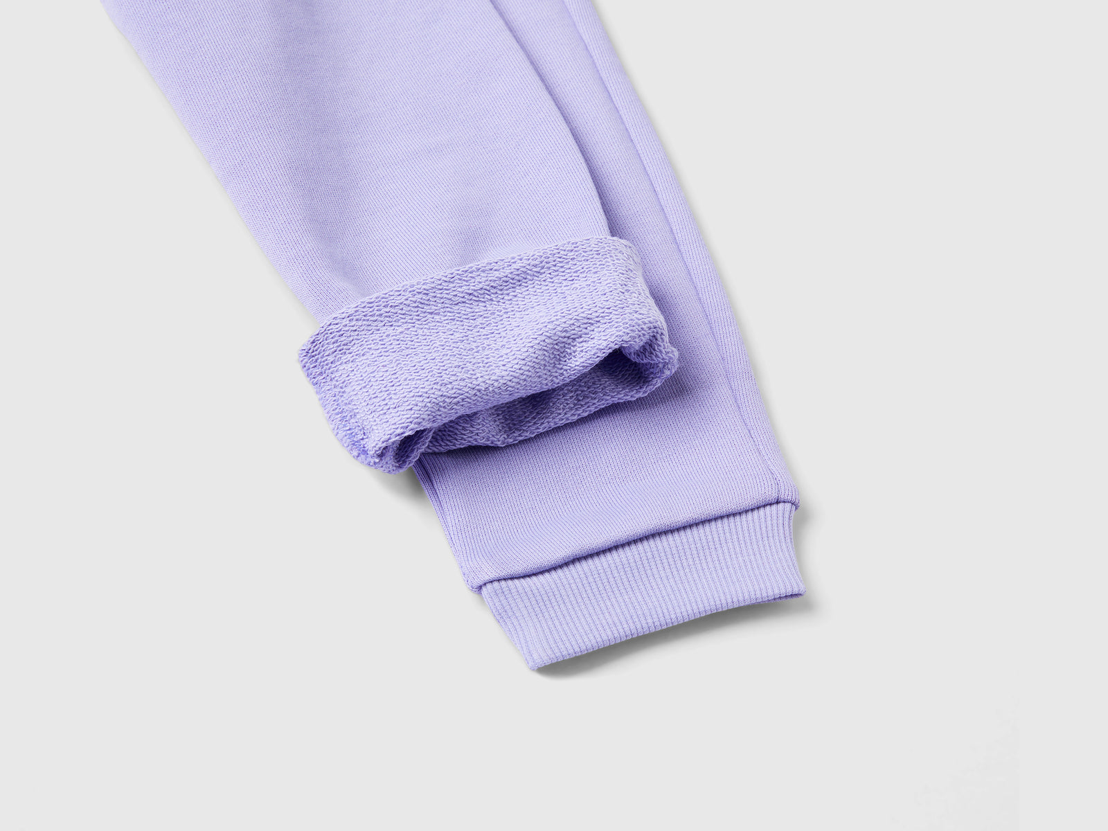 Pantaloni in felpa di cotone bio da bimba lilla 2 | Benetton Outlet