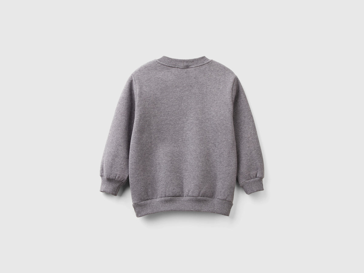 Calda felpa con tasca a marsupio