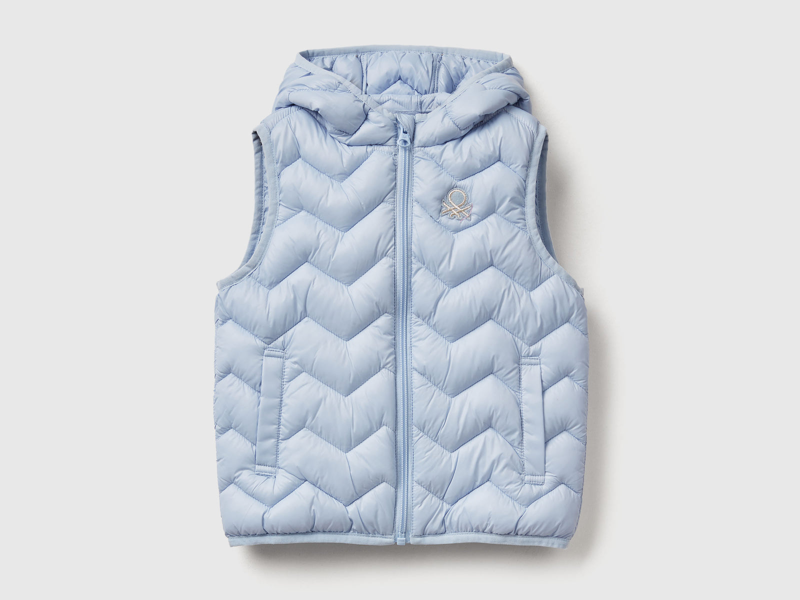 Gilet imbottito con cappuccio da bimba azzurro | Benetton Outlet
