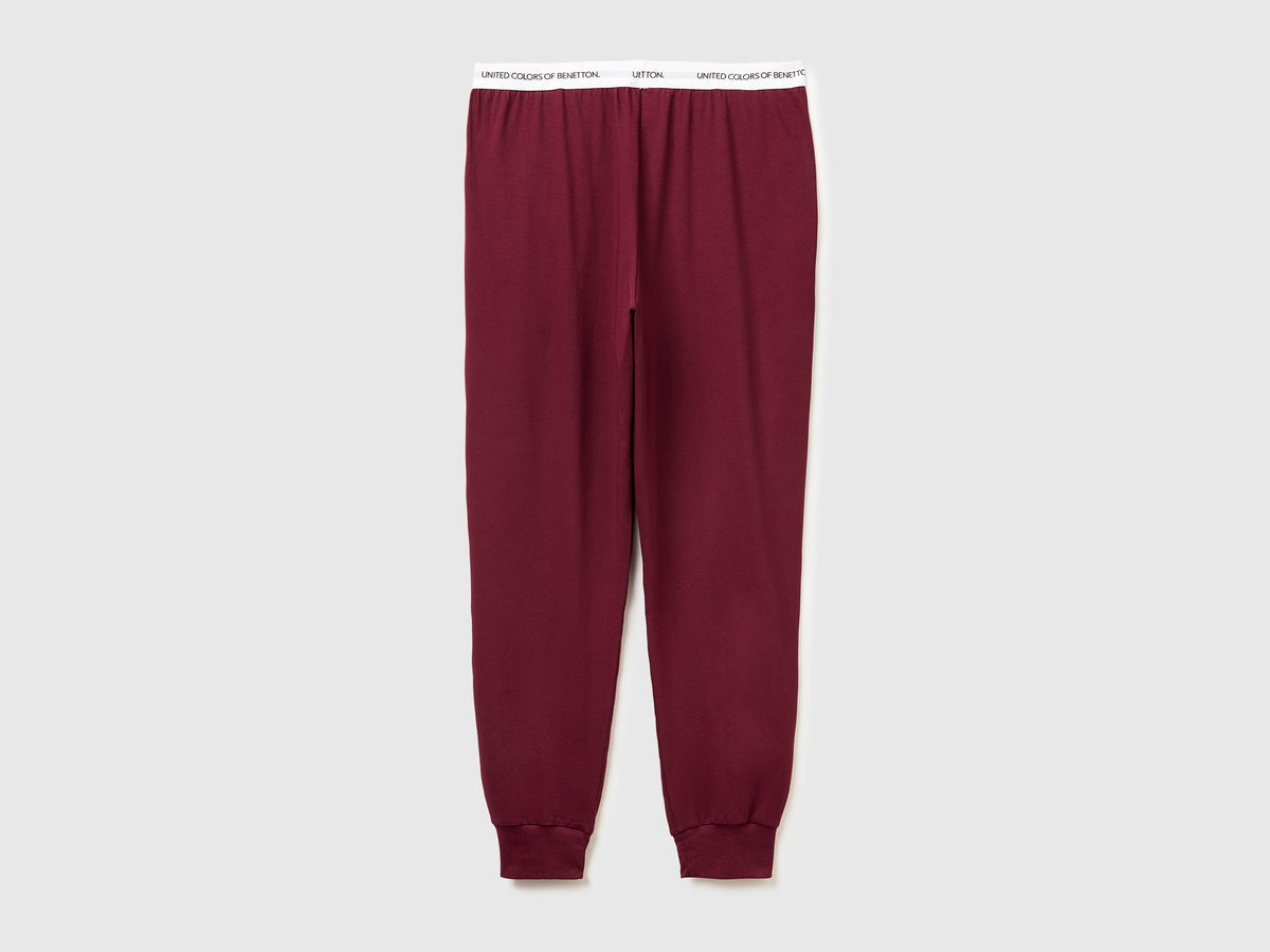 Pantaloni con elastico logato