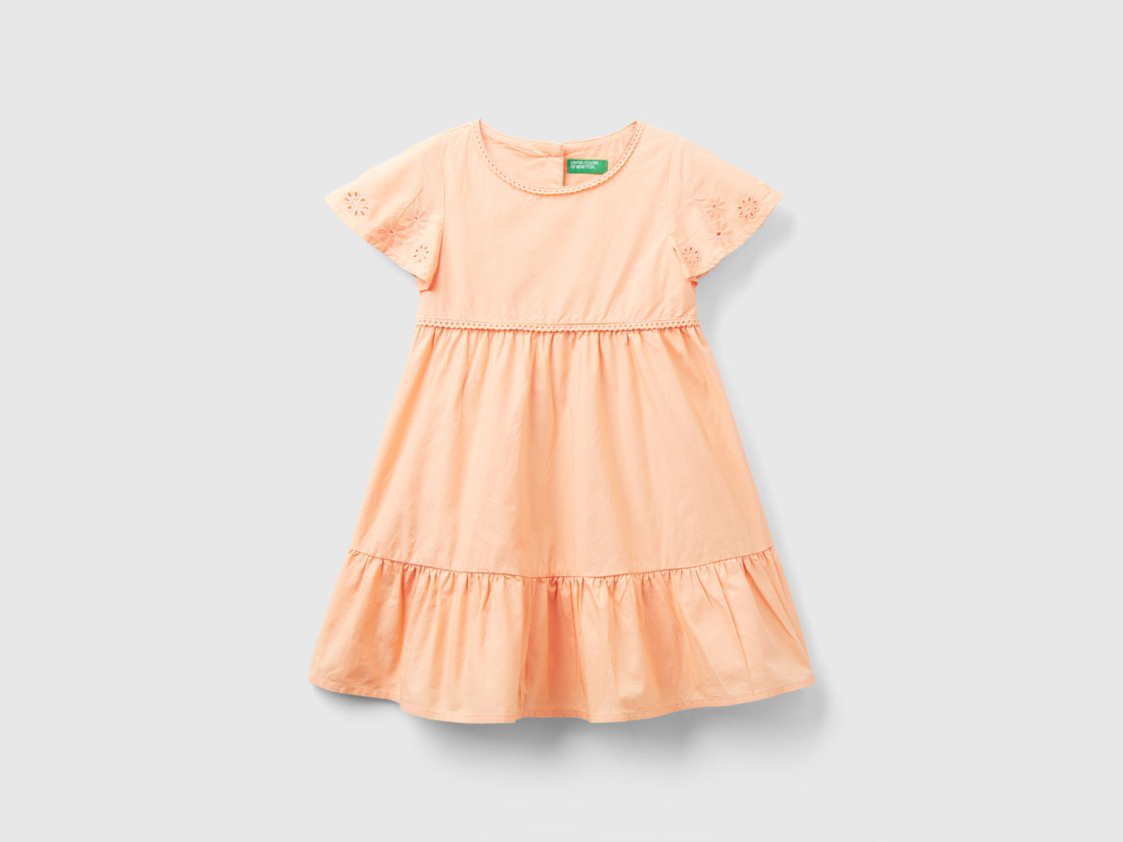 Abito con ricami e balza da bimba pesca | Benetton Outlet