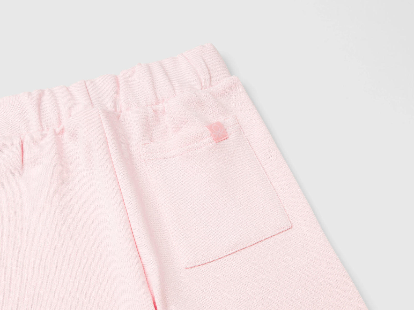 Tuta in felpa con logo da bimbo rosa 3 | Benetton Outlet