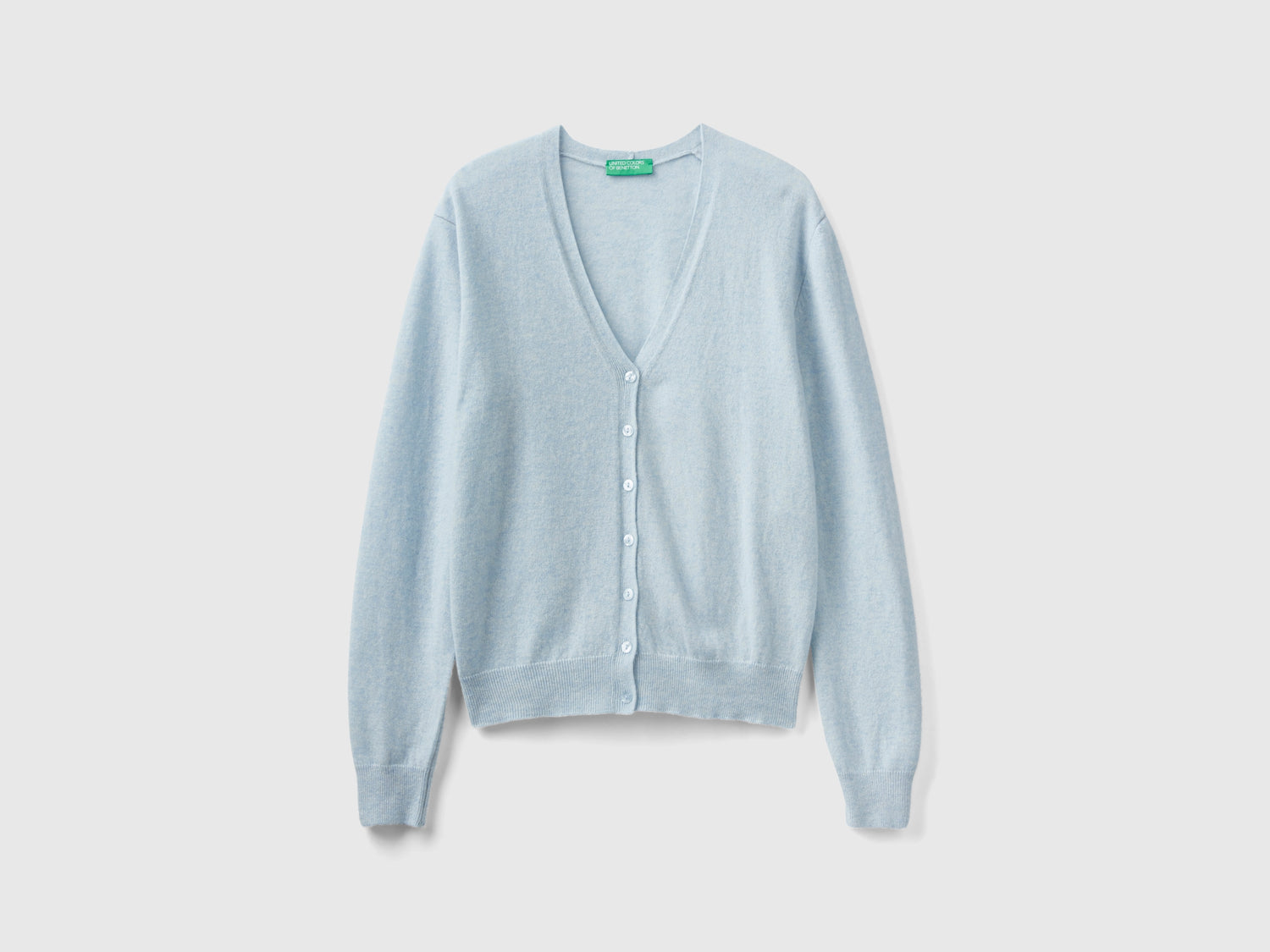 Cardigan scollo a V celeste in pura lana Merino da donna azzurro | Benetton Outlet