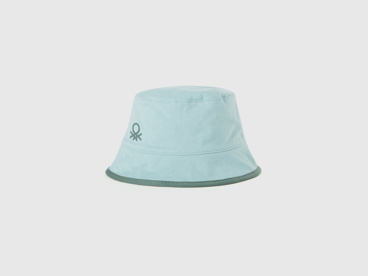 Cappello reversibile con stampa foglie